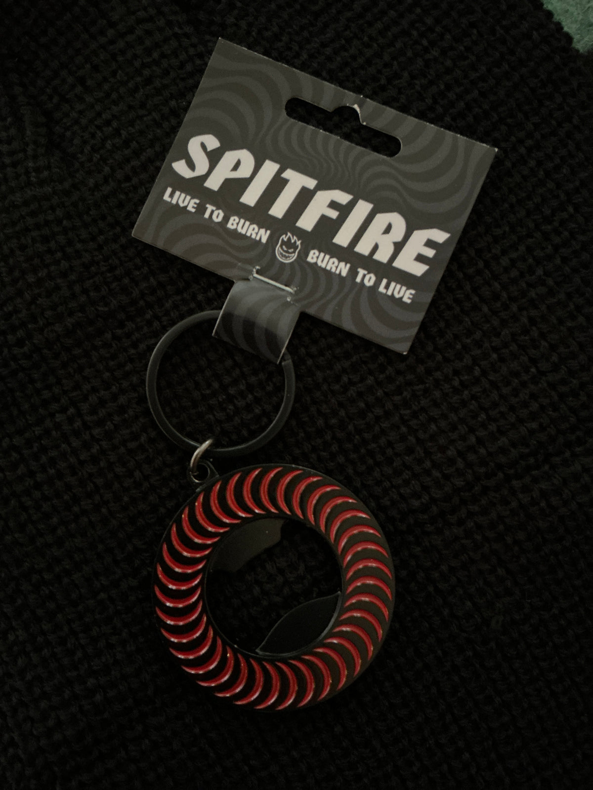 SPITFIRE BOTTLE OPENER BLK RED